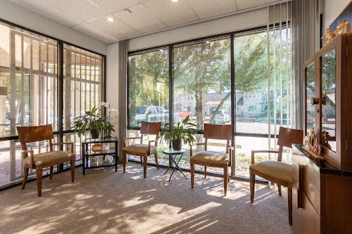 Waiting room with wooden chairs